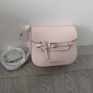 Beautiful baby pink color bag by Michael Kors